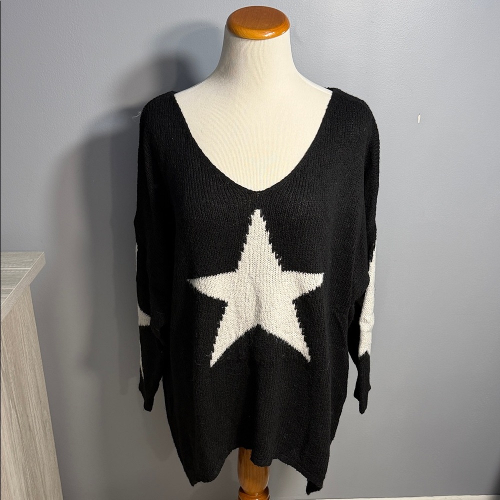 Elegant Black V-Neck Sweater with White Star Design